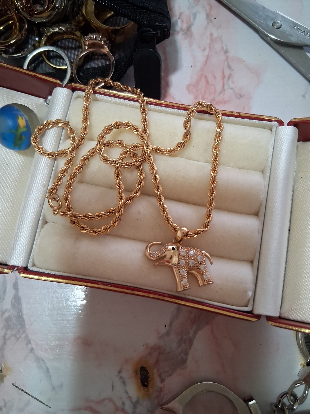 Gold Elephant Pendant Necklace with Crystal Accents